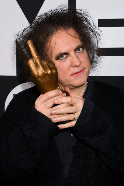 LONDON, ENGLAND - FEBRUARY 12: Robert Smith of The Cure poses withthe Awards for Best Festival Headliner during the NME Awards 2020 at O2 Academy Brixton on February 12, 2020 in London, England. (Photo by Dave J Hogan/Getty Images)