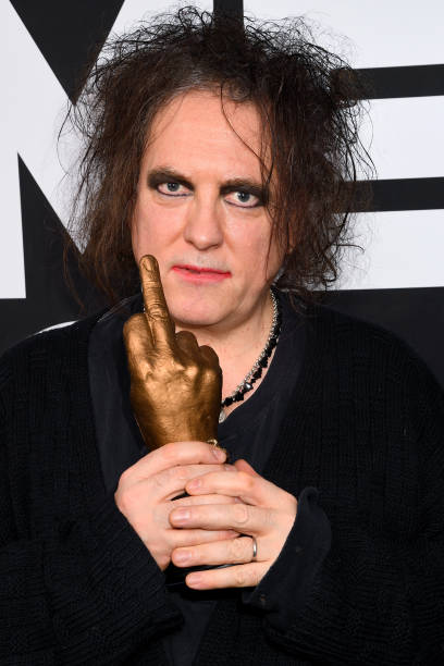 LONDON, ENGLAND - FEBRUARY 12: Robert Smith of The Cure poses withthe Awards for Best Festival Headliner during the NME Awards 2020 at O2 Academy Brixton on February 12, 2020 in London, England. (Photo by Dave J Hogan/Getty Images)