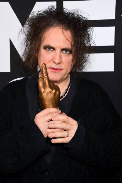 LONDON, ENGLAND - FEBRUARY 12: Robert Smith of The Cure poses withthe Awards for Best Festival Headliner during the NME Awards 2020 at O2 Academy Brixton on February 12, 2020 in London, England. (Photo by Dave J Hogan/Getty Images)