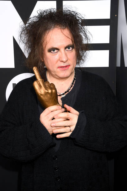 LONDON, ENGLAND - FEBRUARY 12: Robert Smith of The Cure poses withthe Awards for Best Festival Headliner during the NME Awards 2020 at O2 Academy Brixton on February 12, 2020 in London, England. (Photo by Dave J Hogan/Getty Images)