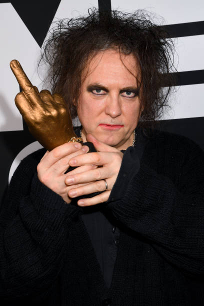 LONDON, ENGLAND - FEBRUARY 12: Robert Smith of The Cure poses withthe Awards for Best Festival Headliner during the NME Awards 2020 at O2 Academy Brixton on February 12, 2020 in London, England. (Photo by Dave J Hogan/Getty Images)