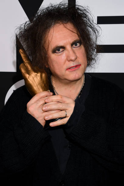 LONDON, ENGLAND - FEBRUARY 12: Robert Smith of The Cure poses withthe Awards for Best Festival Headliner during the NME Awards 2020 at O2 Academy Brixton on February 12, 2020 in London, England. (Photo by Dave J Hogan/Getty Images)